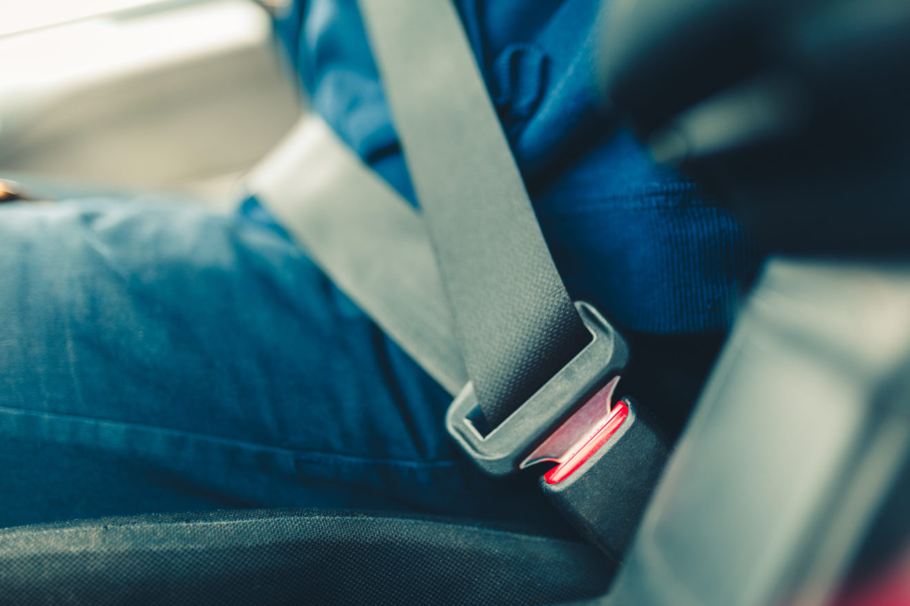 Fastened seat belt of the vehicle. Close the car seat belt, sitt