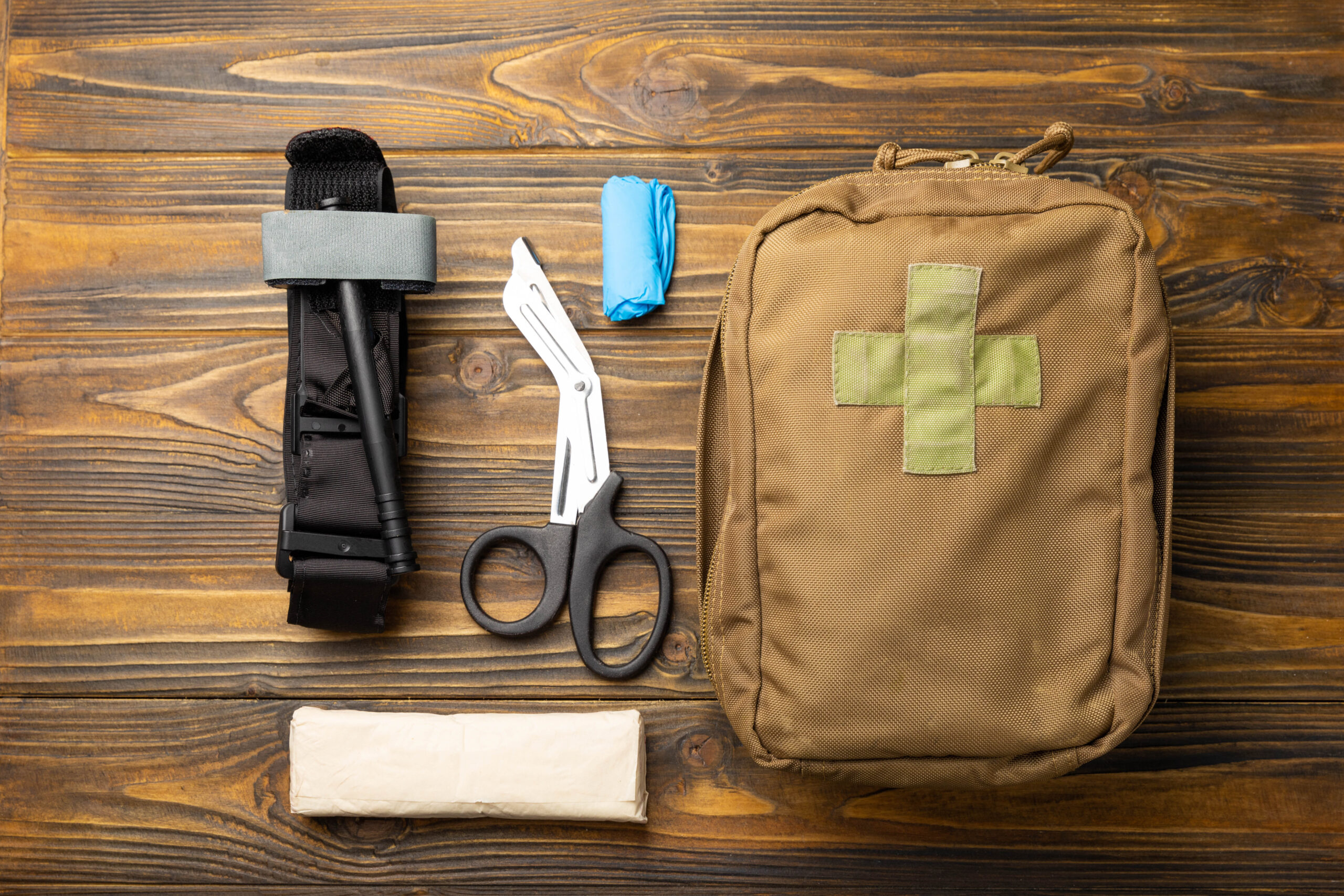 Military first aid kit with a medical tourniquet to stop the blo