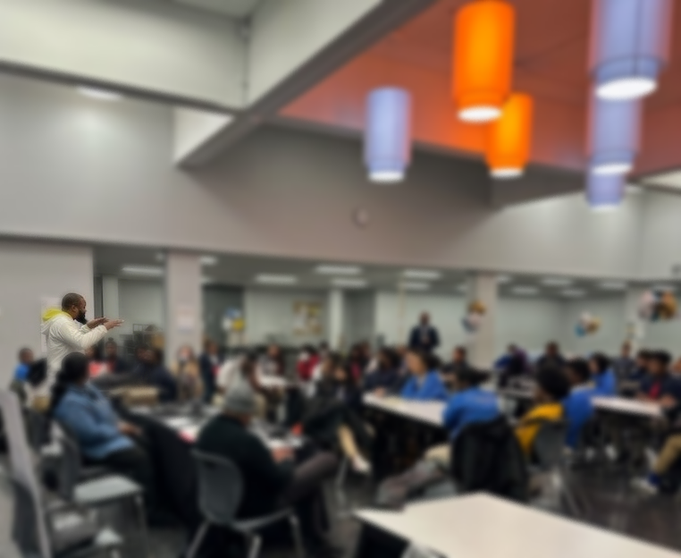 elijah talking to students blurred for privacy