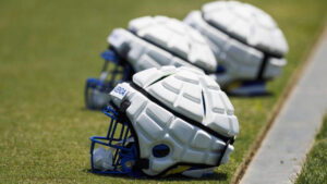 Innovative Helmet Covers Show Promise in Reducing Football Concussions