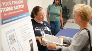 Giving gun locks, safes, and guidance to gun owners and learning what works